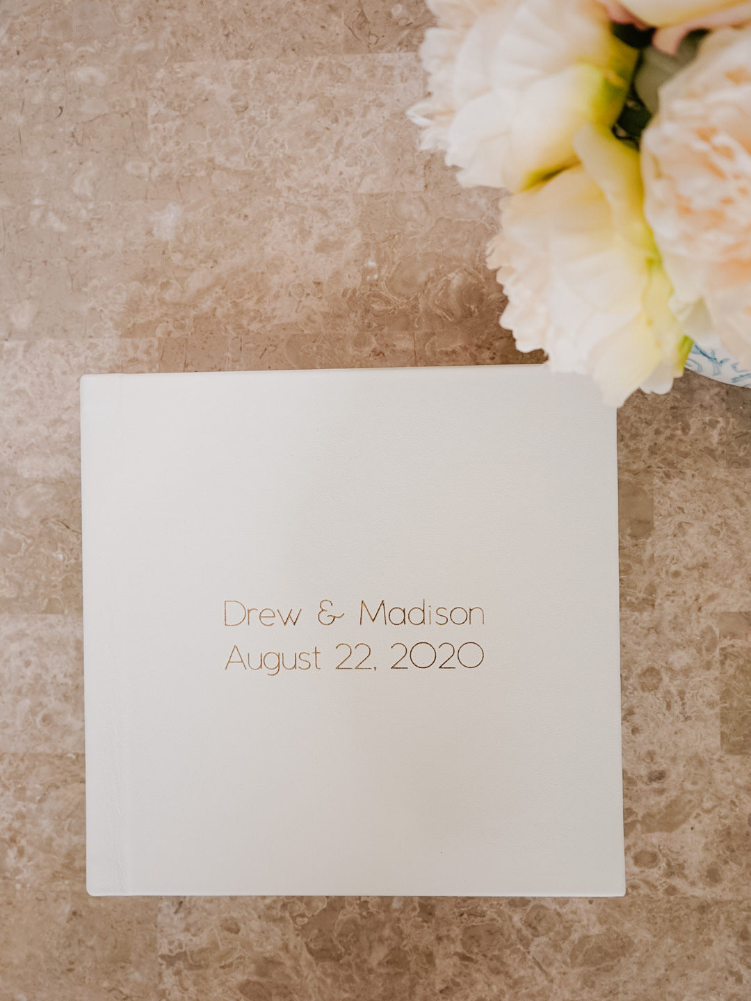 white embossed wedding photo album