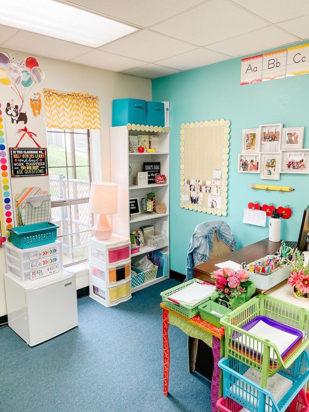 Kindergarten classroom teacher desk rainbow decor