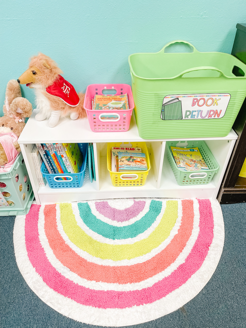 Kindergarten classroom reading corner rug and book return area classroom library